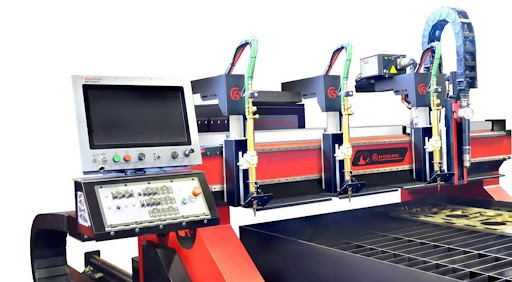 Industrial CNC plasma cutting machine with control panel and multiple cutting torches